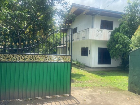 Land with house for sale